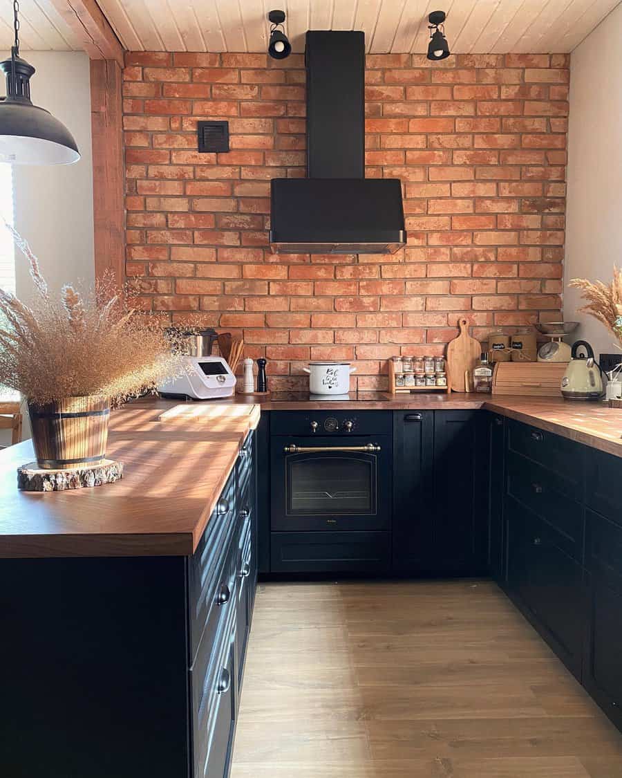 Rustic kitchen with exposed brick wall