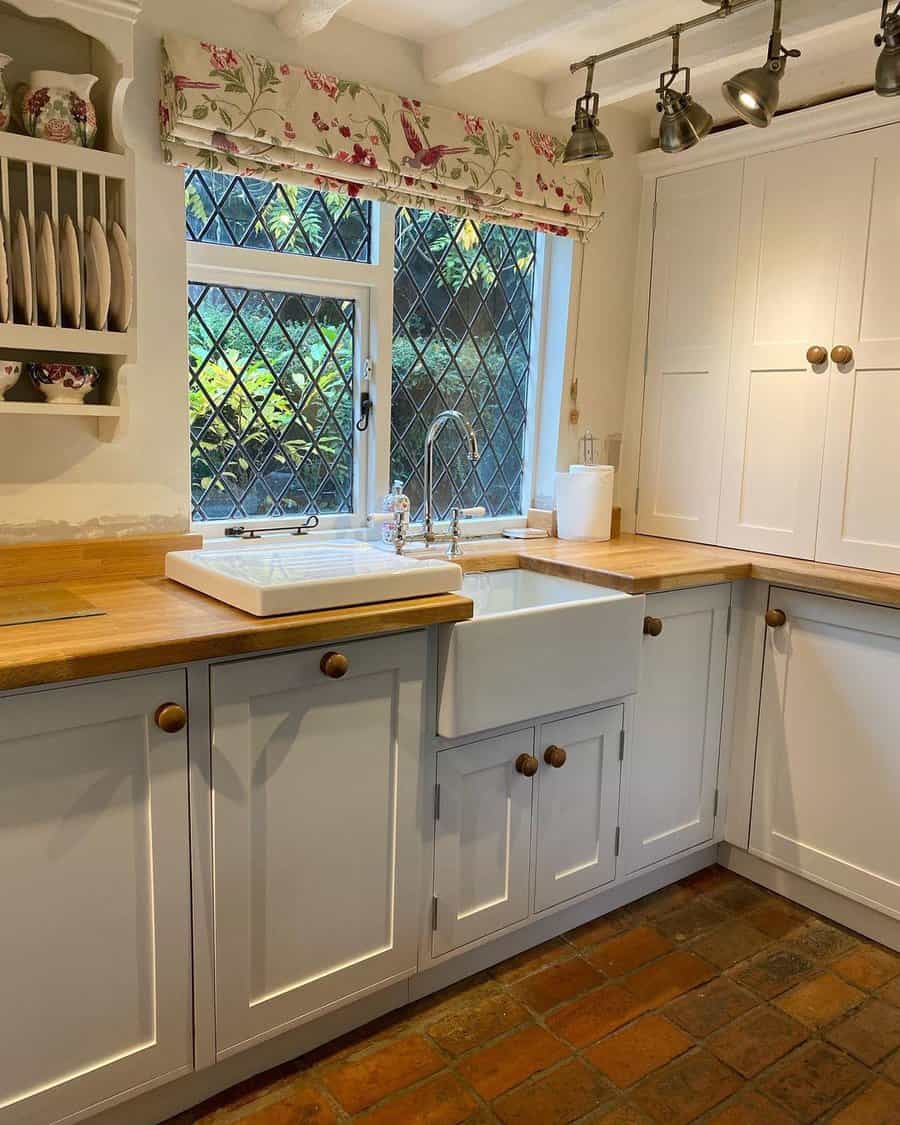 White cabinets with wood countertop
