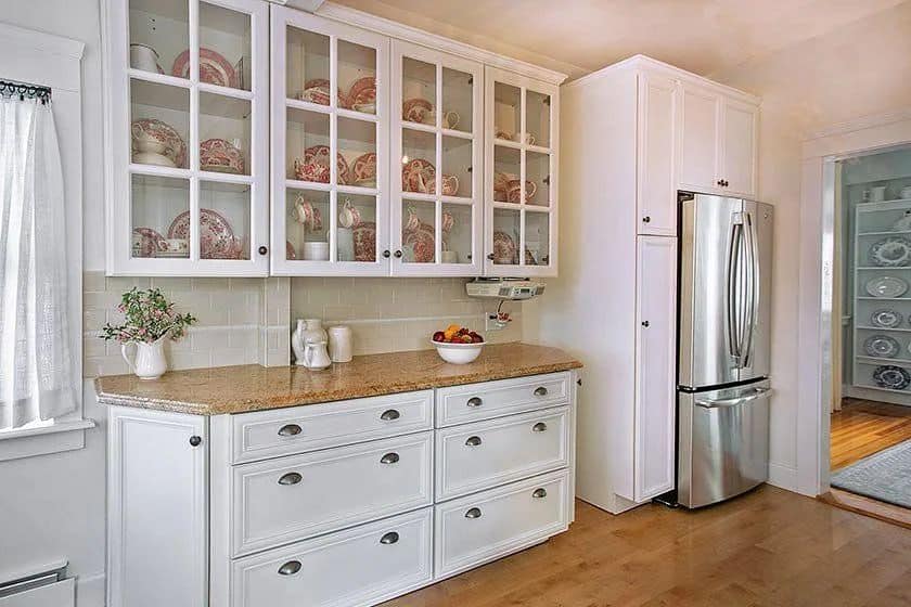 White cabinets with marble countertop