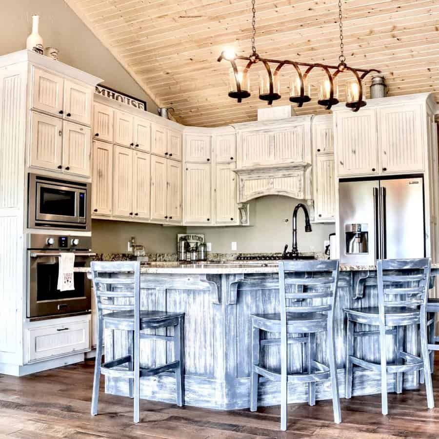Weathered white kitchen cabinets