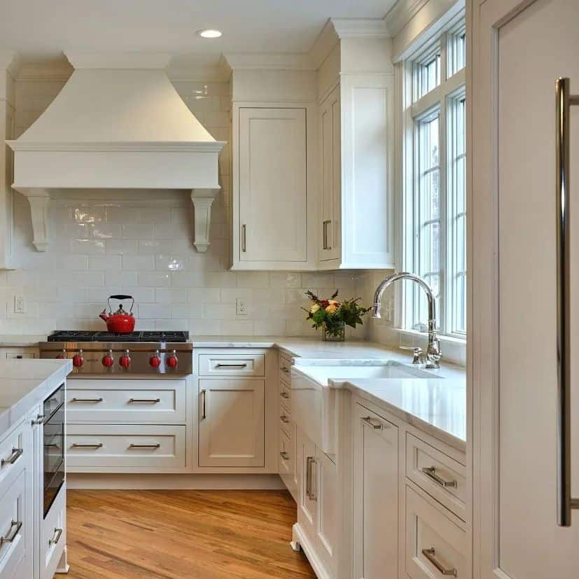 White cabinets with marble countertop