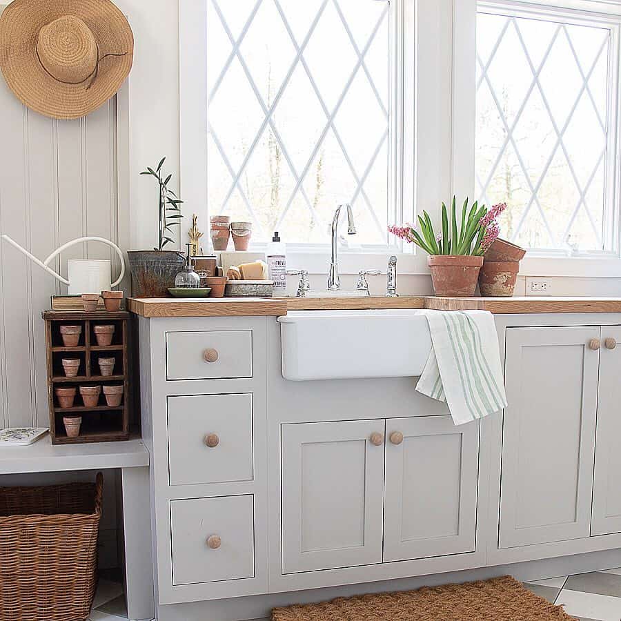 White cabinets with wood countertop