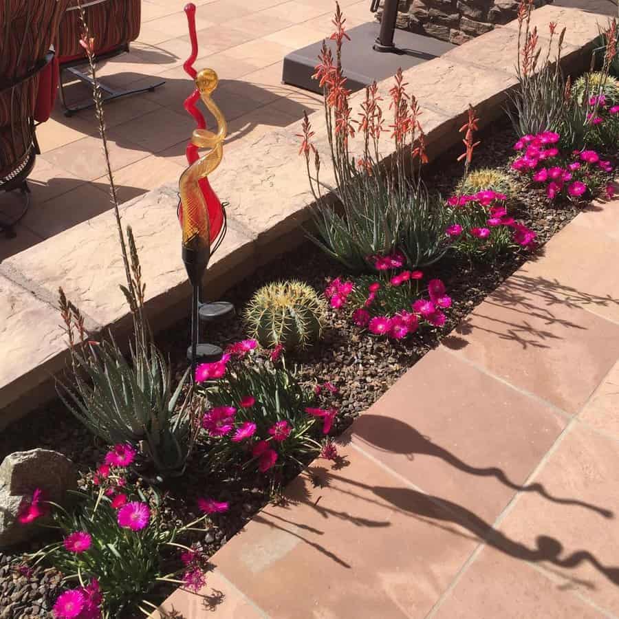 Decorative solar light in flower bed