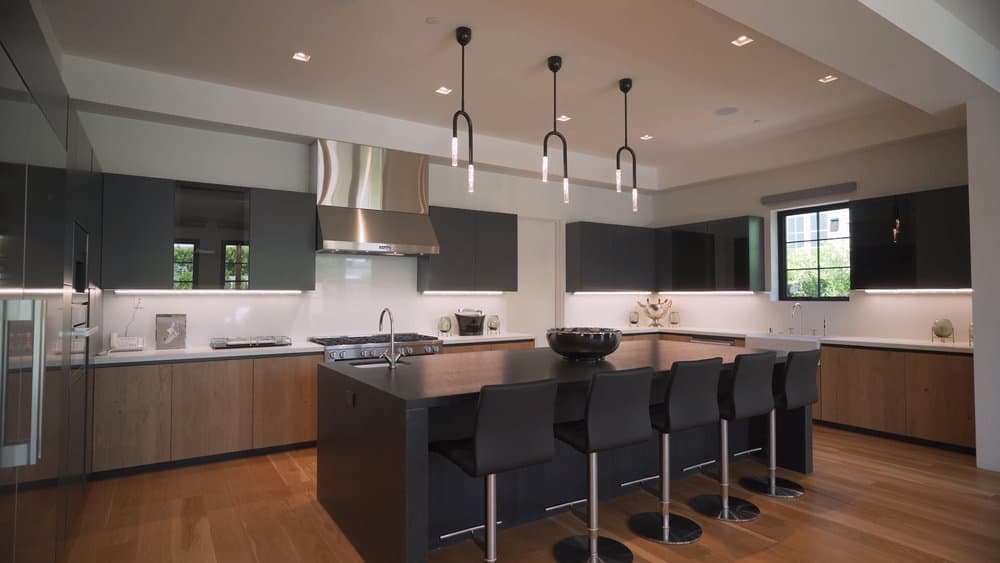 Minimalist Kitchen Island Pendant Lighting Ideas 3 Modern kitchen with chic pendant lights and dark accents