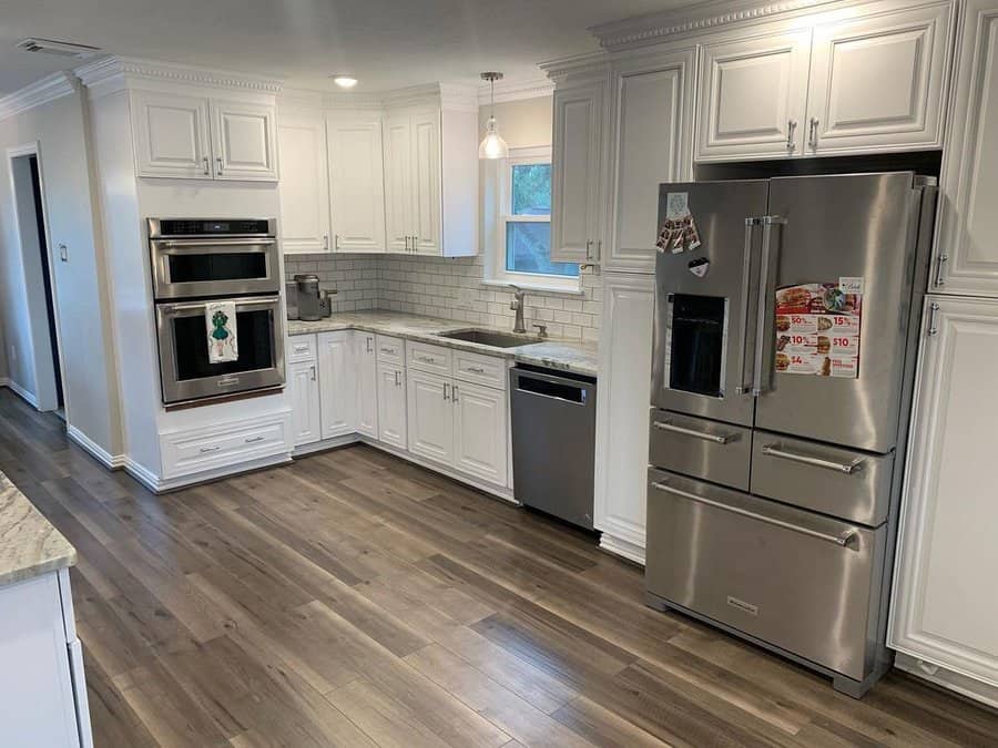 White cabinets with marble countertop