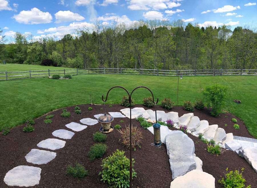 Backyard landscaping with stepping stones