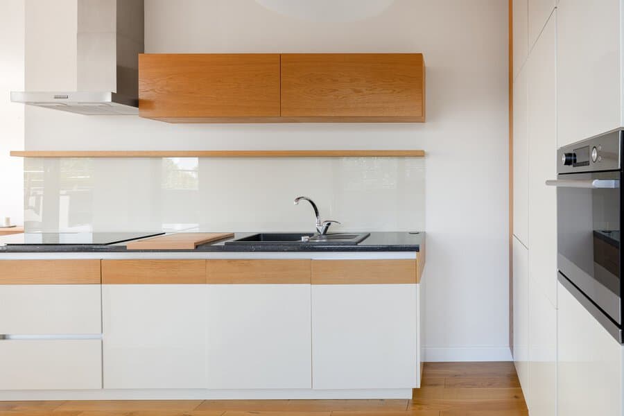 White cabinets with wood accents