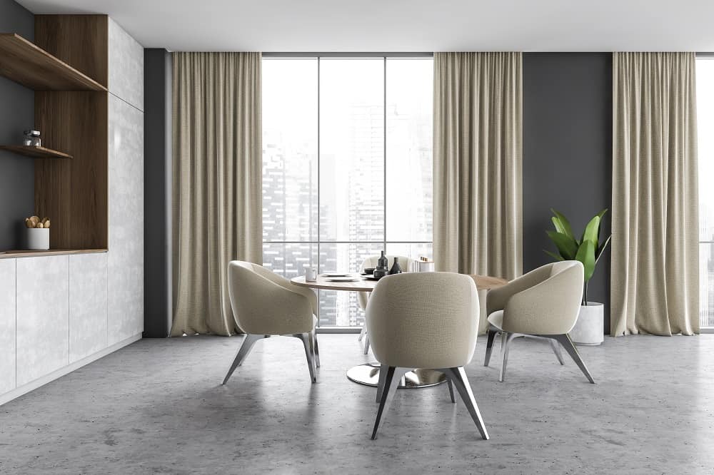 living room on grey wall with beige curtains